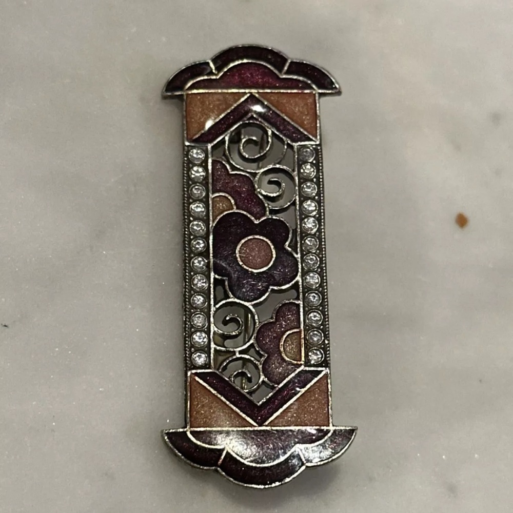 A fine vintage Art Deco style enameled bar brooch by Pierre Bex dating to c1970.